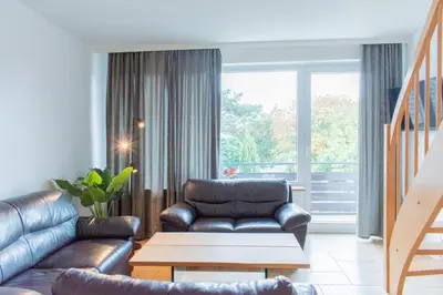 Ein Sitzbereich in der Unterkunft Geräumige Ferienwohnung ANKER in ruhiger Lage