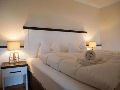 Ein Bett oder Betten in einem Zimmer der Unterkunft App Scharbeutzchen