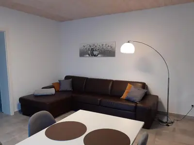 Ein Sitzbereich in der Unterkunft Erdgeschoss-Appartement mit Seeblick