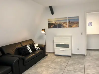 Ein Sitzbereich in der Unterkunft Dachgeschosswohnung mit Seeblick
