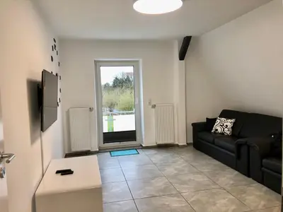 TV/Unterhaltungsangebot in der Unterkunft Dachgeschosswohnung mit Seeblick