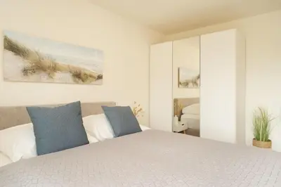 Ein Bett oder Betten in einem Zimmer der Unterkunft Pier 67 Ostseeglück Neustadt