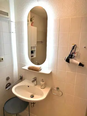 Ein Badezimmer in der Unterkunft Apartment Kaiserperle mit Balkon direkt am Strand
