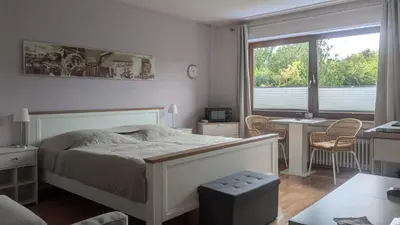 Ein Bett oder Betten in einem Zimmer der Unterkunft Travemünde Kleine Perle