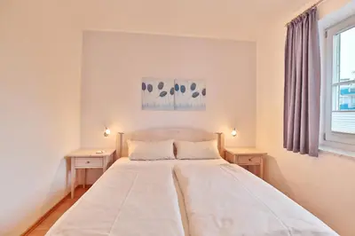 Ein Bett oder Betten in einem Zimmer der Unterkunft Hanseaten Residenz Hanseaten-Residenz Appartement 4
