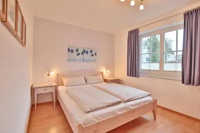 Ein Bett oder Betten in einem Zimmer der Unterkunft Hanseaten Residenz Hanseaten-Residenz Appartement 4
