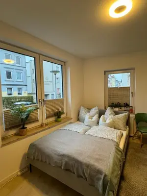 Ein Bett oder Betten in einem Zimmer der Unterkunft Near Holstentor modern apartment near the center with wifi