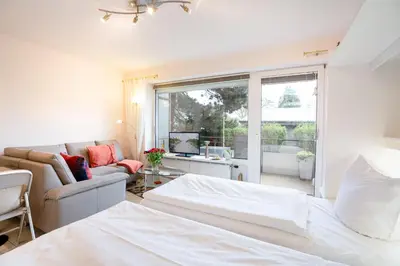 Ein Bett oder Betten in einem Zimmer der Unterkunft DKK1b Ferienwohnung Stäcker F