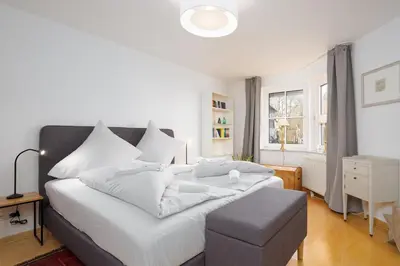Ein Bett oder Betten in einem Zimmer der Unterkunft OST29a Ferienwohnung Strandliebe