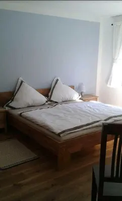 Ein Bett oder Betten in einem Zimmer der Unterkunft Liebevoller Landhaustraum