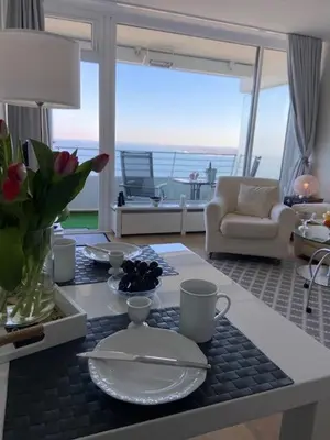 Ein Sitzbereich in der Unterkunft Top - Seaside Appartement mit Meerblick