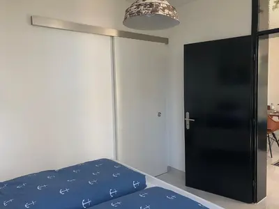 Ein Bett oder Betten in einem Zimmer der Unterkunft Ferienwohnung Ostsee Timmendorferstrand