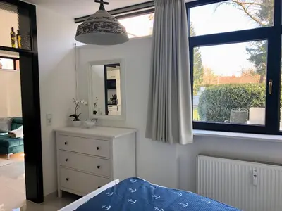 Ein Bett oder Betten in einem Zimmer der Unterkunft Ferienwohnung Ostsee Timmendorferstrand