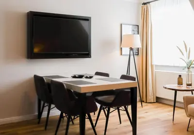 TV/Unterhaltungsangebot in der Unterkunft Gemütliche & moderne Ferienwohnung - nur 7 Gehminuten vom Strand entfernt, inklusive Parkplatz und Gartenzugang