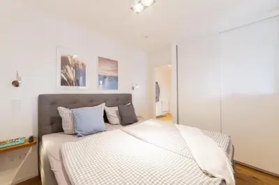 Ein Bett oder Betten in einem Zimmer der Unterkunft Ferienwohung BeachSide No 19