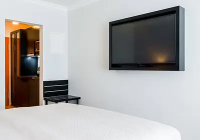 TV/Unterhaltungsangebot in der Unterkunft Moderne Ferienwohnung mit Sonnenterrasse & Gartenblick - Strandnah und hohem Schlafkomfort