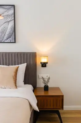 Ein Bett oder Betten in einem Zimmer der Unterkunft Hochwertige Ferienwohnung in ruhiger Lage mit eigener Terrasse und Parkplatz, nur 7 Gehminuten zum Strand entfernt - hoher Schlafkomfort dank Boxspringbett
