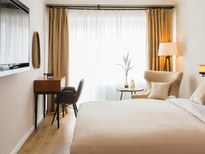 Ein Bett oder Betten in einem Zimmer der Unterkunft Hochwertige Ferienwohnung in ruhiger Lage mit eigener Terrasse und Parkplatz, nur 7 Gehminuten zum Strand entfernt - hoher Schlafkomfort dank Boxspringbett