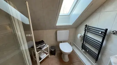 Ein Badezimmer in der Unterkunft Travemünde Leuchtfeuer