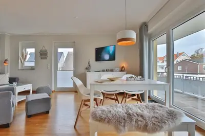 Ein Sitzbereich in der Unterkunft Haus Sommerwind Sommerwind, Appartement 4