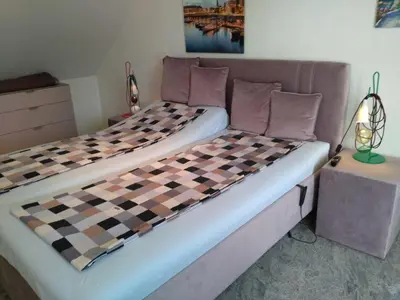 Ein Bett oder Betten in einem Zimmer der Unterkunft Seehof 6