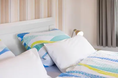 Ein Bett oder Betten in einem Zimmer der Unterkunft STOE3 Ferienwohnung Waack