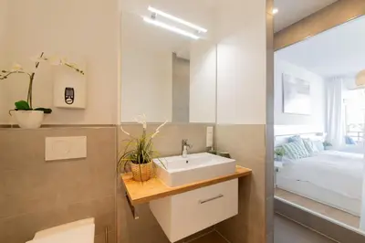 Ein Badezimmer in der Unterkunft Ferienwohnung Ocean Lodge Travemünde