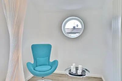 Ein Sitzbereich in der Unterkunft Bungalow am Karkstieg Bungalow Jacobsmuschel