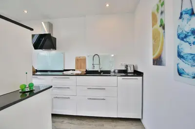 Küche/Küchenzeile in der Unterkunft Bungalow am Karkstieg Bungalow Jacobsmuschel