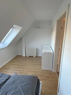 Ein Bett oder Betten in einem Zimmer der Unterkunft Ferienhaus Wesloer Landstraße 6a für 4 Personen