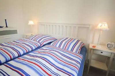 Ein Bett oder Betten in einem Zimmer der Unterkunft Haus Sonneneck
