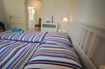 Ein Bett oder Betten in einem Zimmer der Unterkunft Haus Sonneneck
