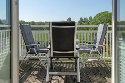 Ein Balkon oder eine Terrasse in der Unterkunft Strandallee 53 Sonnendeck