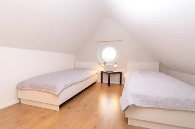 Ein Bett oder Betten in einem Zimmer der Unterkunft Strandallee 53 Sonnendeck