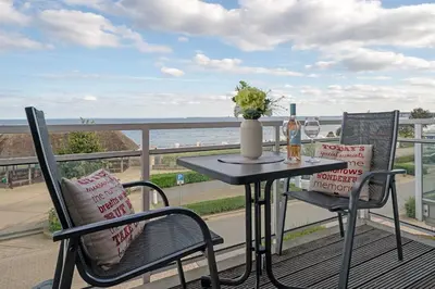 Ein Balkon oder eine Terrasse in der Unterkunft Strand Domizil Wohnung 12