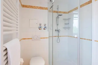 Ein Badezimmer in der Unterkunft Strand Domizil Wohnung 12