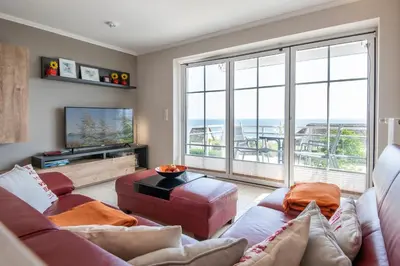 TV/Unterhaltungsangebot in der Unterkunft Strand Domizil Wohnung 12