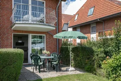Ein Garten an der Unterkunft Strandresidenz Wohnung 1