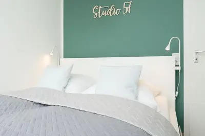 Ein Bett oder Betten in einem Zimmer der Unterkunft Seetempel Studio 57