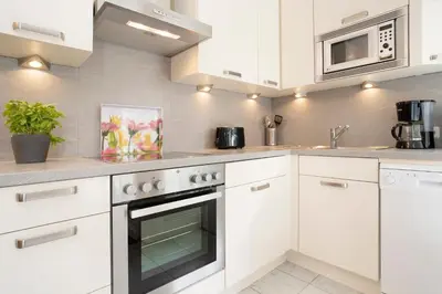 Küche/Küchenzeile in der Unterkunft Strandallee 92b- Wohnung 18