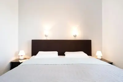 Ein Bett oder Betten in einem Zimmer der Unterkunft Strandresidenz Lütte Deern 10