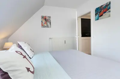 Ein Bett oder Betten in einem Zimmer der Unterkunft Strandresidenz Deern 17