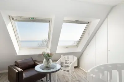 Ein Sitzbereich in der Unterkunft Strandresidenz Deern 17