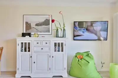 TV/Unterhaltungsangebot in der Unterkunft Strandduene Stranddüne Appartement 3
