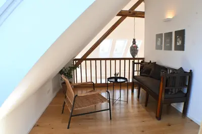 Ein Sitzbereich in der Unterkunft Heuboden