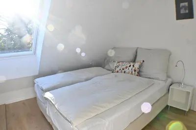 Ein Bett oder Betten in einem Zimmer der Unterkunft Heuboden