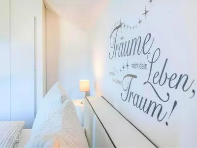 Ein Bett oder Betten in einem Zimmer der Unterkunft Meertraum Premium Wohnung mit 3 Zimmern, 250m zum Strand