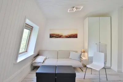 Ein Sitzbereich in der Unterkunft Haus Miramar TREF Appartement 40 Meeresrauschen
