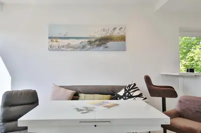 Ein Sitzbereich in der Unterkunft Haus Miramar TREF Appartement 40 Meeresrauschen