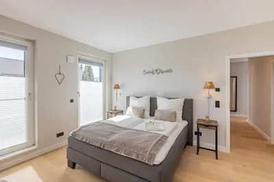 Ein Bett oder Betten in einem Zimmer der Unterkunft BLACK PEARL Penthouse Black Pearl